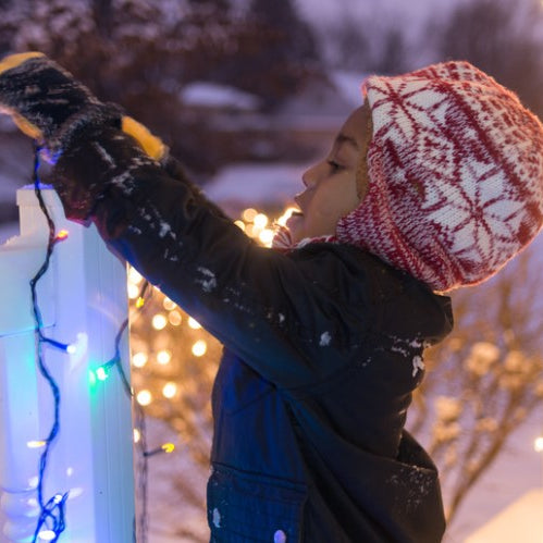 Setting Up Outdoor Christmas Lights with Safety and Style