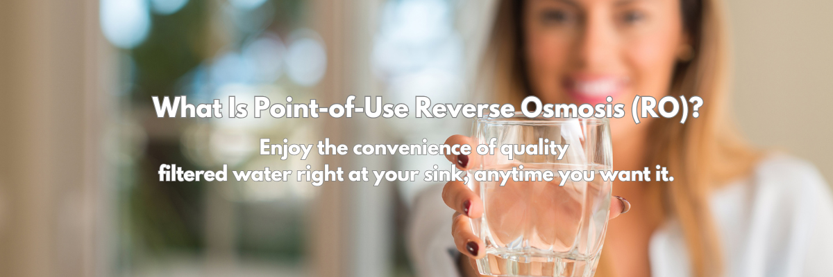 Woman holding out a glass of water with the text what is RO