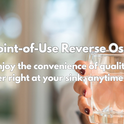 Woman holding out a glass of water with the text what is RO