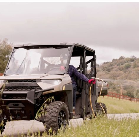 Tomahawk Power barrel mount sprayer showing Honda GX35 engine and hose reel equipment
