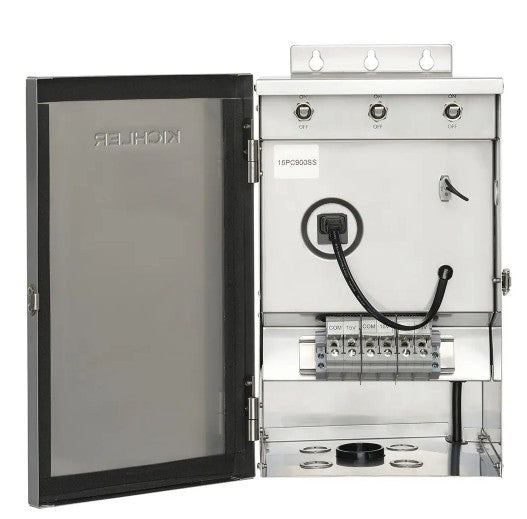 A stainless steel electrical distribution cabinet with its door open, showing internal terminal blocks, a black cable, and control switches. The brand name 'KICHLER' is visible on the inner door panel.