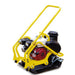 Tomahawk Power TPC90H plate compactor showing water tank, engine, and compaction plate