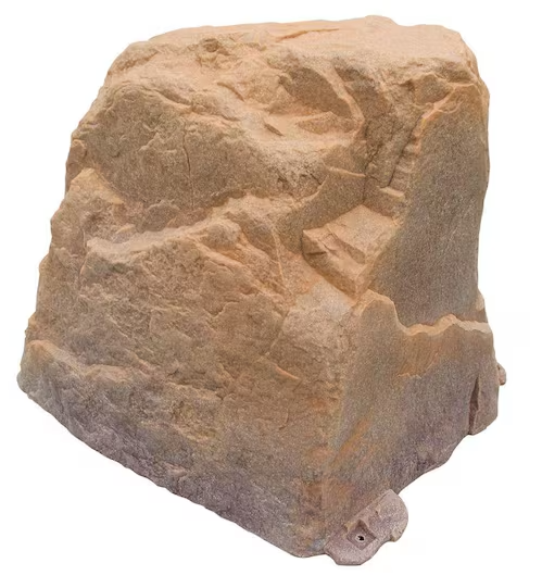 A realistic tan and brown rock prop with a textured surface and a small protruding piece at the bottom, isolated on a white background.