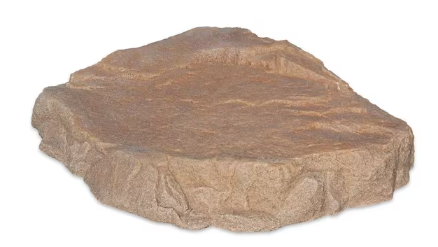 A decorative faux rock garden stone with a textured, layered surface in earthy brown and beige tones, isolated on a white background.