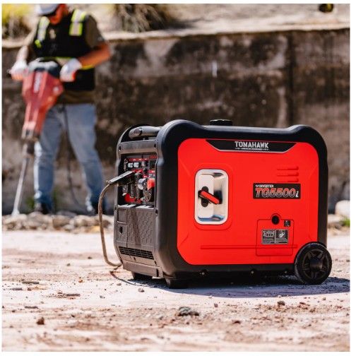 Tomahawk Power TG5500i generator showing housing and control panel details