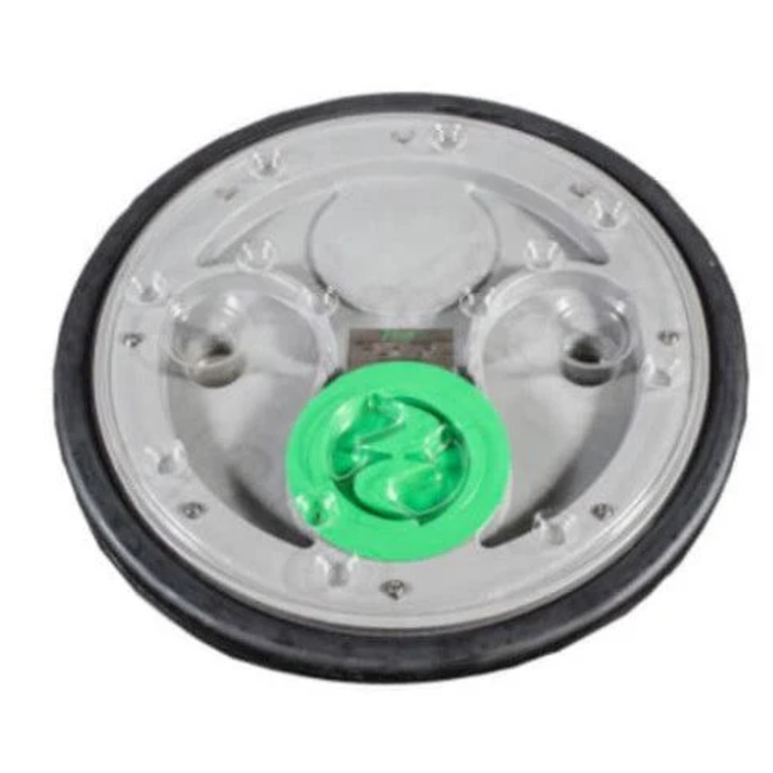 Round mechanical component with a green center on a white background