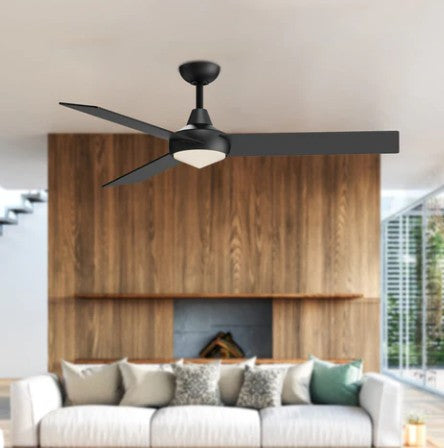 Modern black ceiling fan in a living room with a white sofa and wooden wall.