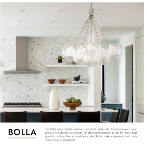Modern kitchen with a Bolla chandelier, featuring clear glass design.