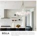 Modern kitchen with a Bolla chandelier, featuring clear glass design.