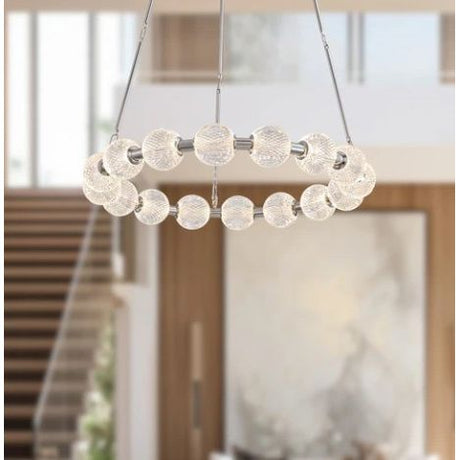 Modern chandelier with glass balls in a room with blurred background