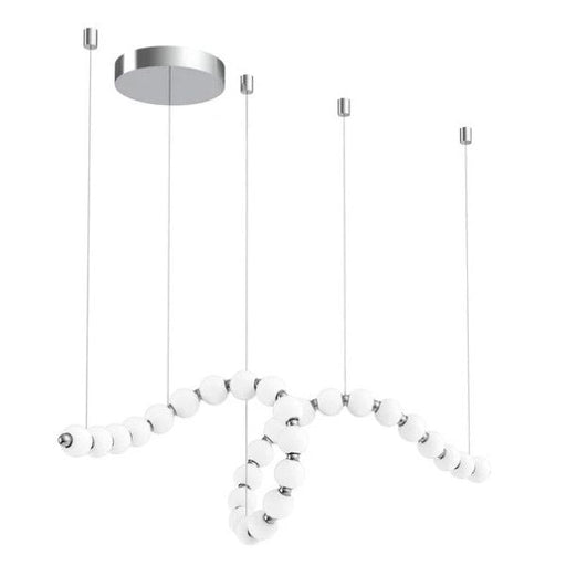Modern pendant light with white glass shades on a white background