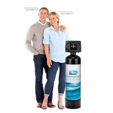 Two people standing next to a water filter on a white background