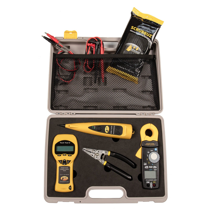 Electrical testing kit with tools including a multimeter, voltage tester, and pliers in a carrying case.