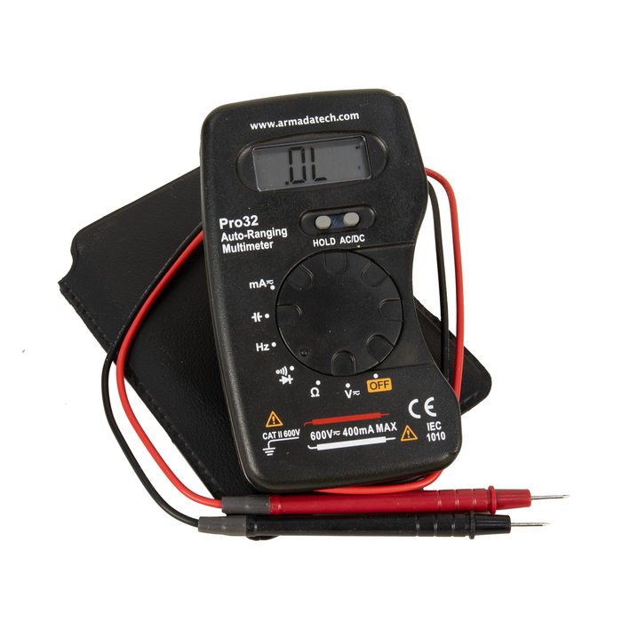 Digital multimeter with red and black probes on a white background