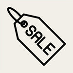 Black 'SALE' tag on a white background