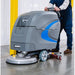 Tomahawk Power TAS850e floor scrubber showing scrub head, tank, and handle details