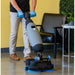Tomahawk Power TMOP18e mini floor scrubber showing handle and scrub head detail