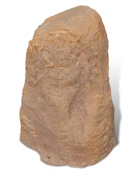 A natural tan stone or rock sculpture with a rough, textured surface, shown on a plain white background.