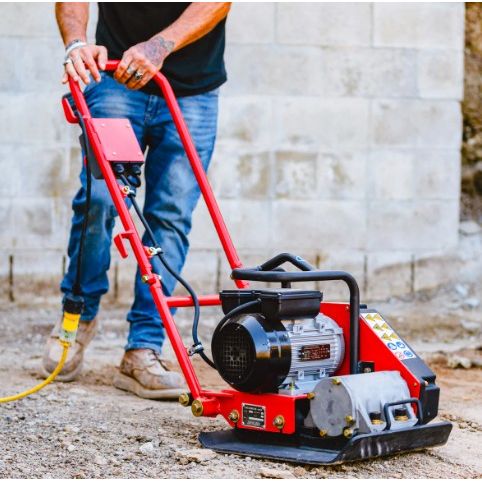 Tomahawk Power eJXPC50 electric plate compactor showing motor, handle, and steel base plate