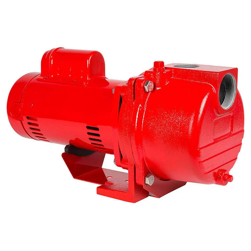 A red cast iron sprinkler pump with visible electrical components and piping.
